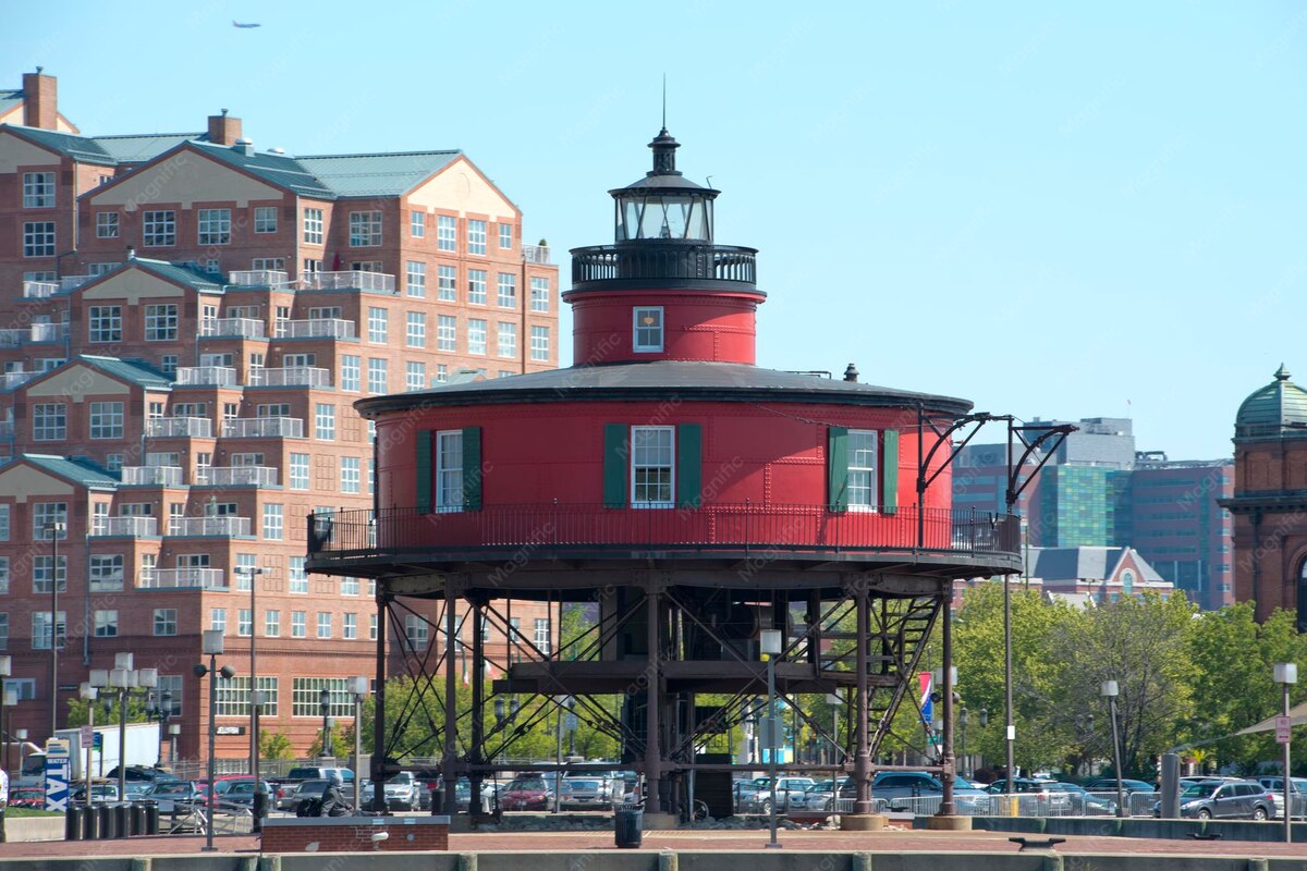 Red lighthouse on the Baltimore harbor waterfront in Maryland